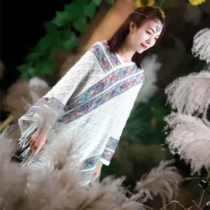 White knitted tassel poncho shawl for women, cozy outdoor vacation travel cape clothing.