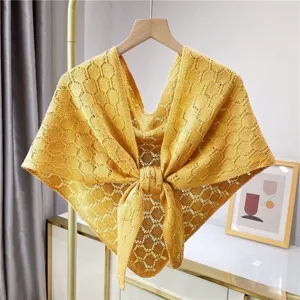 Yellow knitted hollow out shawl detail, triangular scarf design, soft texture, elegant daily wear.