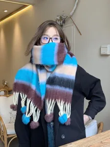 Colorful rainbow gradient mohair winter scarf with cute tassels, soft and warm fashion wear.