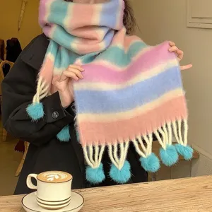 Detailed view of a colorful rainbow mohair winter scarf with cozy dopamine candy colors and tassels.