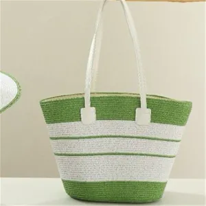 Green and white striped straw tote bag detailed view, elegant casual beach handbag for summer travel.