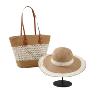 Conjunto de bolso de paja y sombrero de sol de ala ancha para viajes al aire libre.