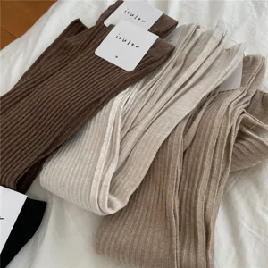 Cozy ribbed over-the-knee high socks in versatile neutral colors for women daily wear.