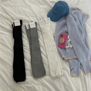 Knit over-the-knee stockings for women, comfortable long ribbed socks in solid colors.