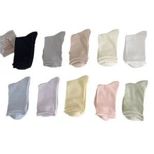 Women's solid color rolled edge vertical stripe mid-calf cotton socks breathable thin.