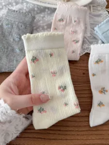 Calze floreali a metà tubo da donna in stile giapponese con bordo in pizzo e tessuto a rete.