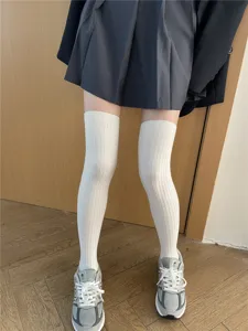 Ribbed over-the-knee socks for women, solid color knee-high stockings for daily wear.