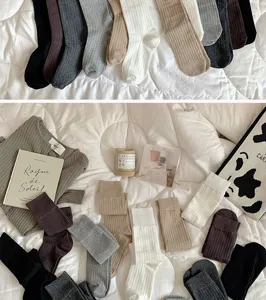Solid color knit knee high socks long boot socks casual slouch socks detail view for women