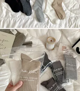 Solid color ribbed calf socks for women, comfortable long tube cotton stockings for autumn winter.
