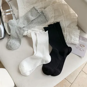 Women ballet style ruffle mid-tube socks, breathable cotton hollow mesh design, detail shot.