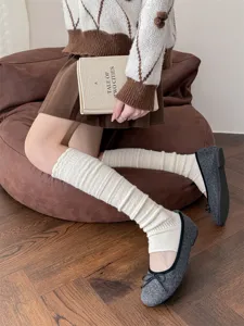 Cashmere footless leg warmers for women, cozy winter thermal hollow out knit boot socks.