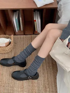 Grey long slouch socks for women, winter warm knitted tube socks, vintage aesthetic casual leg warmers.