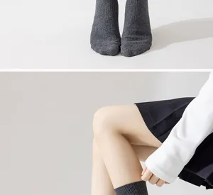 Comfortable grey ribbed knit knee high socks for women, perfect for autumn and winter daily wear.