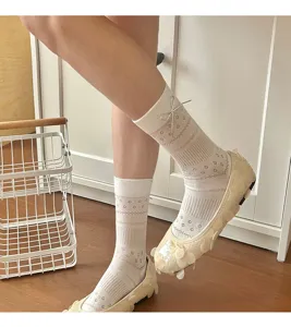 Sweet Korean style women mesh mid-calf socks with delicate bow detail, breathable and stylish.