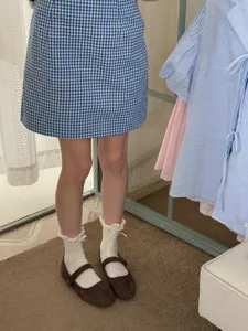 Ruffle bow mid-tube socks with sweet lace trim, soft breathable cotton for daily wear.