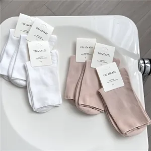 Cotton mid-tube socks set, comfortable everyday wear for women, soft solid colors.