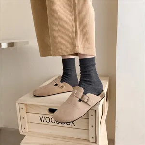 Detail shot of women's autumn winter ribbed mid tube socks in versatile style, soft and cozy.