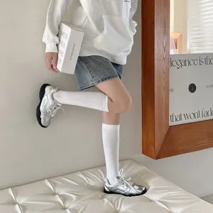 Korean style solid color high tube white socks for women fashion daily wear comfortable cotton material.