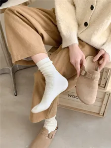 Comfortable women's white ribbed pile socks, cozy autumn winter vertical striped mid-tube socks.