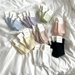 Women's mid-tube cotton socks in multi-color sets, soft breathable casual daily wear socks.