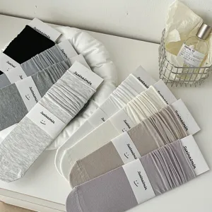 Japanese style solid color slouch socks for women, comfortable mid tube casual cotton socks.