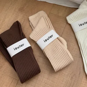IOULOR premium women long slouch knit socks, warm solid color calf socks product detail view