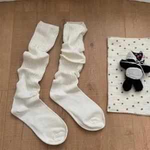 Cozy white slouch socks for women, soft knit long tube socks for autumn and winter daily wear.