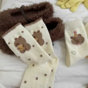 Cute cartoon embroidered warm mid-tube socks for women with lovely polka dot patterns.