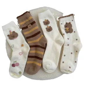 Cozy Australian wool mid-tube socks featuring cute cartoon bear designs, stripes, and dots for winter.