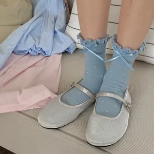 Sweet polka dot frilly mid-calf socks with cute bow for women, breathable spring style.