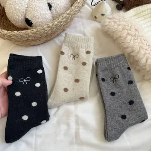 Thickened warm wool socks for women, featuring cute polka dots and bow embroidery details.