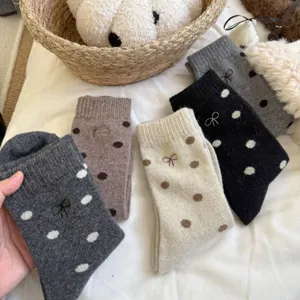 Winter thick wool socks detail, cute polka dot and bow embroidery design, cozy and warm.