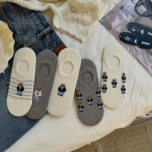 Detailed view of women's spring summer cotton boat socks featuring cute bear knit patterns.