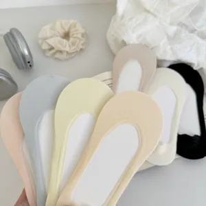 Detail view of pastel invisible boat socks showcasing breathable ice silk and soft cotton base.