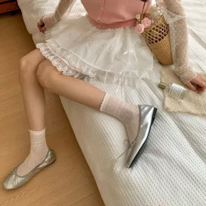 Korean sweet hollow polka dot mid-calf socks for women, fashionable, cute and breathable daily wear.