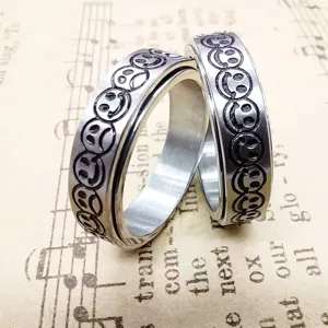 Bague spinner en acier inoxydable avec visages souriants et tristes gravés, bijoux rétro.