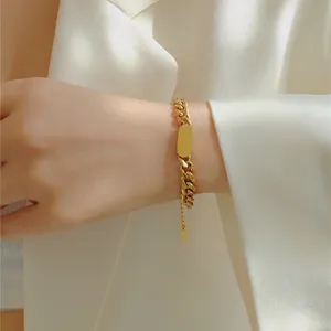 Close-up detail of the gold-plated cuban link bracelet, showcasing the polished metallic texture.