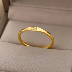 Stainless steel gold ring with angel number 888 engraving minimalist jewelry detail