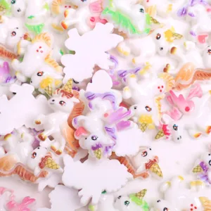 Detailed close-up of colorful resin unicorn flatbacks, ideal for DIY crafts and decor.