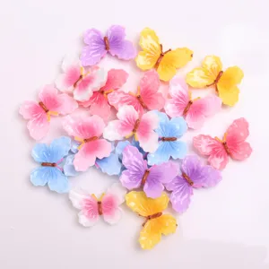 Close-up view of colorful resin butterfly accessories, perfect for DIY phone cases and crafts.