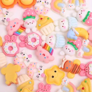 Close-up of colorful resin cartoon cat star rainbow craft charms cute DIY accessories