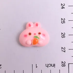 Cute pink cartoon rabbit resin flatback charm holding a carrot for DIY hair accessories.