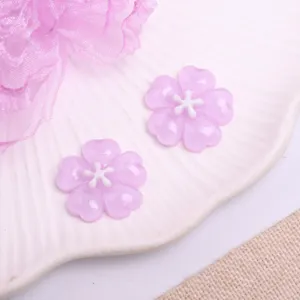 Resin flower charms for DIY hair accessories, glossy purple five-petal floral patch detail.