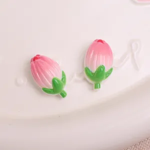 Close-up of 3D pink tulip resin cabochons, perfect for DIY phone case charms and cute hair accessories.