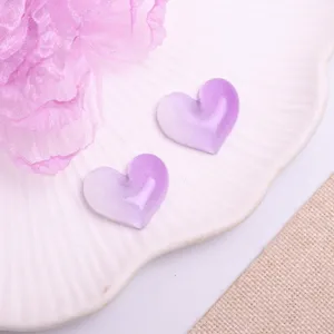 Purple gradient resin heart charm detail shot for DIY hair accessories and crafts.