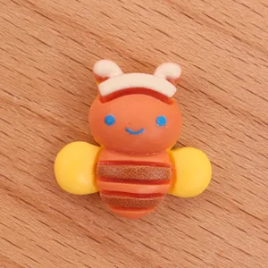 Resin cute bee cabochon detail shot, perfect for DIY phone case, hair clip and craft decorating.