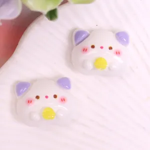 Cute resin animal charms detail showing glossy cartoon design for DIY phone case hair clips.