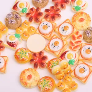 Resin mini bread fried egg toast cabochons detailed close-up shot for DIY hair clips crafting.