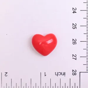Red heart resin charm detail view, perfect for DIY handmade hair clips and phone cases accessories