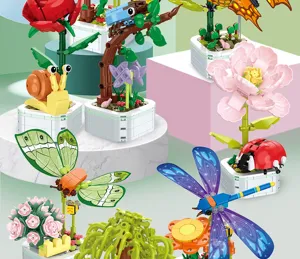 DIY building block flowers and cute insect toys set, colorful desktop display.